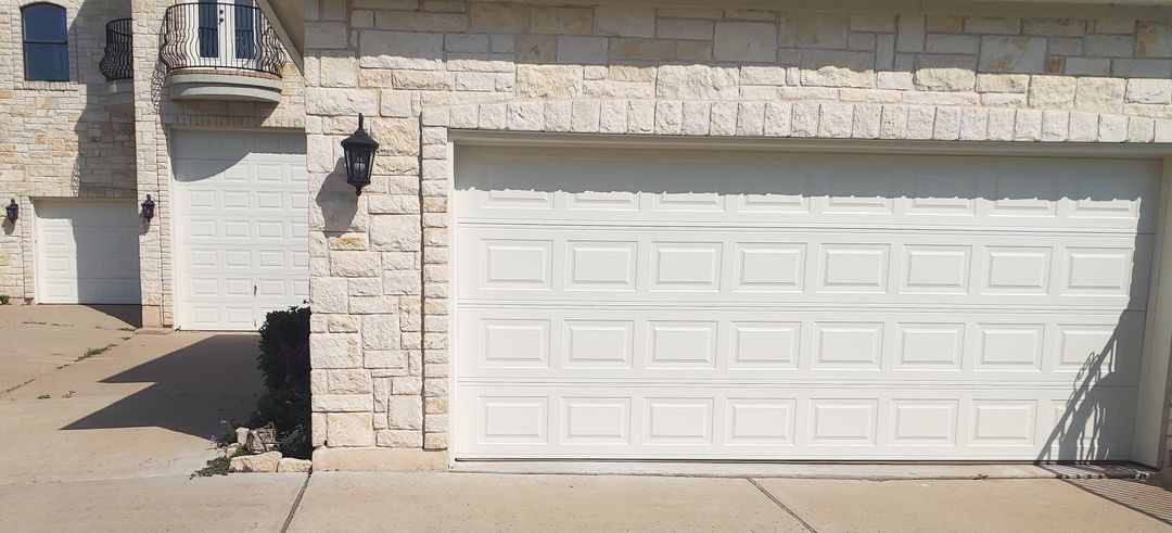 RV garage door alongside 8 by 7 and 16 by 7 doors